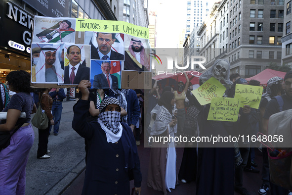 Palestinian supporters march through the streets with flags and signs against the October 2023 Israeli incursion of Gaza, on October 7, 2024...