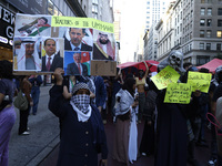 Palestinian supporters march through the streets with flags and signs against the October 2023 Israeli incursion of Gaza, on October 7, 2024...