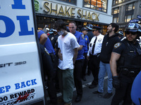 Palestinian supporters are arrested by the New York City police during a march against the October 2023 Israeli incursion of Gaza, on Octobe...