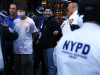 Palestinian supporters are arrested by the New York City police during a march against the October 2023 Israeli incursion of Gaza, on Octobe...