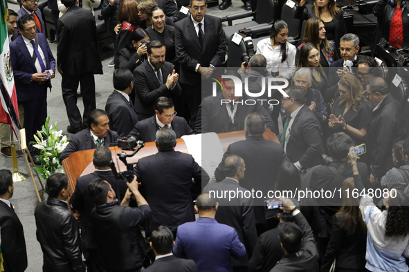 Persons carry a coffin with the body of Ifigenia Martinez during the posthumous funeral tribute in honor of Ifigenia Martinez, 99, in the Ch...