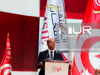 The head of the Tunisian election commission, Farouk Bouasker, gives a press conference to announce the preliminary results of the president...