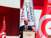 The head of the Tunisian election commission, Farouk Bouasker, gives a press conference to announce the preliminary results of the president...