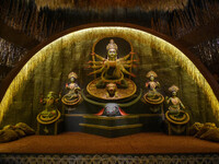 An idol of Goddess Durga is seen at a temporary place of worship called a pandal during the Durga Puja festival celebration in Kolkata, Indi...