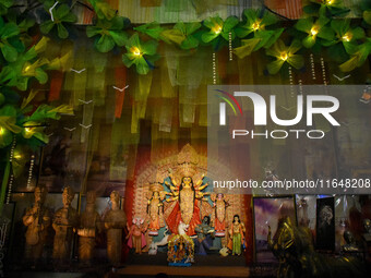 An idol of Goddess Durga is seen at a temporary place of worship called a pandal during the Durga Puja festival celebration in Kolkata, Indi...