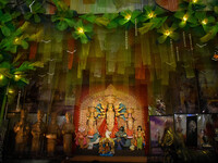 An idol of Goddess Durga is seen at a temporary place of worship called a pandal during the Durga Puja festival celebration in Kolkata, Indi...