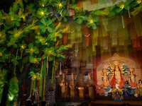 An idol of Goddess Durga is seen at a temporary place of worship called a pandal during the Durga Puja festival celebration in Kolkata, Indi...