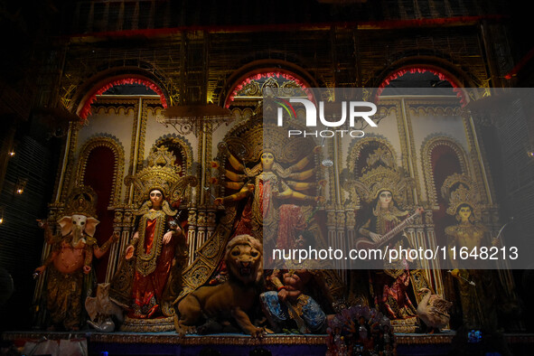 An idol of Goddess Durga is seen at a temporary place of worship called a pandal during the Durga Puja festival celebration in Kolkata, Indi...