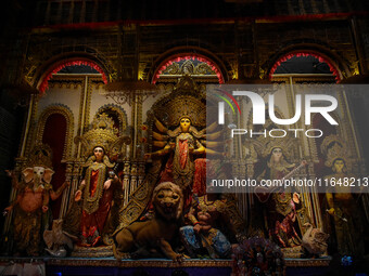 An idol of Goddess Durga is seen at a temporary place of worship called a pandal during the Durga Puja festival celebration in Kolkata, Indi...