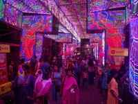 A street is lit with various decorative lights during the Durga Puja festival in Kolkata, India, on October 7, 2024. (