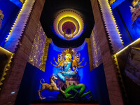 An idol of Goddess Durga is seen at a temporary place of worship called a pandal during the Durga Puja festival celebration in Kolkata, Indi...