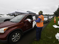 Residents of Orange County, Florida, collect sandbags for free to protect themselves from Hurricane Milton, which is expected this week. The...