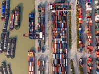 In Huai'an, China, on October 8, 2024, a photo shows transport ships in the port, dock, and river of the Beijing-Hangzhou Grand Canal in Hua...