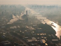 In Huai'an, China, on October 8, 2024, a photo shows transport ships in the port, dock, and river of the Beijing-Hangzhou Grand Canal in Hua...