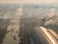 In Huai'an, China, on October 8, 2024, a photo shows transport ships in the port, dock, and river of the Beijing-Hangzhou Grand Canal in Hua...