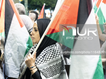 Hundreds of pro-Palestinian demonstrators march on the Israeli embassy in Athens, Greece, on October 7, 2024. (