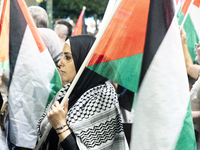 Hundreds of pro-Palestinian demonstrators march on the Israeli embassy in Athens, Greece, on October 7, 2024. (