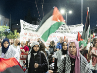 Hundreds of pro-Palestinian demonstrators march on the Israeli embassy in Athens, Greece, on October 7, 2024. (