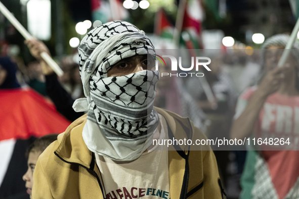 Hundreds of pro-Palestinian demonstrators march on the Israeli embassy in Athens, Greece, on October 7, 2024. 