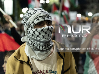 Hundreds of pro-Palestinian demonstrators march on the Israeli embassy in Athens, Greece, on October 7, 2024. (