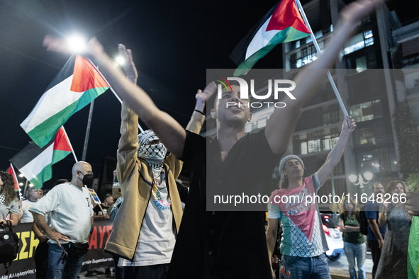 Hundreds of pro-Palestinian demonstrators march on the Israeli embassy in Athens, Greece, on October 7, 2024. 