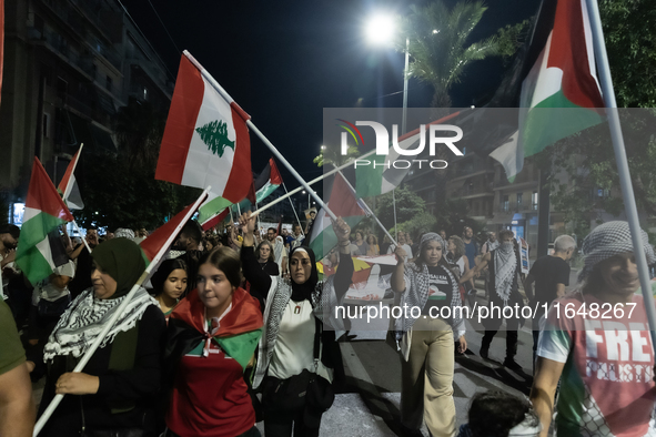 Hundreds of pro-Palestinian demonstrators march on the Israeli embassy in Athens, Greece, on October 7, 2024. 