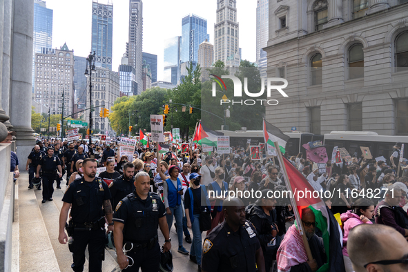 Pro-Palestinian protesters commemorate the anniversary of the October 7, 2023, Hamas attack on Israel in New York City, USA, on October 7, 2...