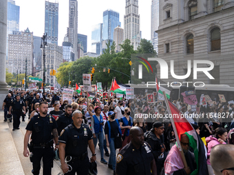 Pro-Palestinian protesters commemorate the anniversary of the October 7, 2023, Hamas attack on Israel in New York City, USA, on October 7, 2...