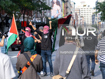 Pro-Palestinian protesters commemorate the anniversary of the October 7, 2023, Hamas attack on Israel in New York City, USA, on October 7, 2...