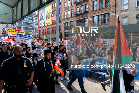 Pro-Palestinian protesters commemorate the anniversary of the October 7, 2023, Hamas attack on Israel in New York City, USA, on October 7, 2...