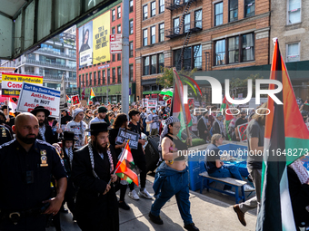 Pro-Palestinian protesters commemorate the anniversary of the October 7, 2023, Hamas attack on Israel in New York City, USA, on October 7, 2...