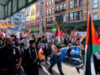 Pro-Palestinian protesters commemorate the anniversary of the October 7, 2023, Hamas attack on Israel in New York City, USA, on October 7, 2...