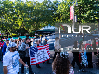 Pro-Palestinian protesters commemorate the anniversary of the October 7, 2023, Hamas attack on Israel in New York City, USA, on October 7, 2...