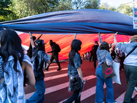 Pro-Palestinian protesters commemorate the anniversary of the October 7, 2023, Hamas attack on Israel in New York City, USA, on October 7, 2...