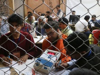 Election officials count votes for the local assembly elections at a counting center in Srinagar, Jammu and Kashmir, on October 8, 2024. (