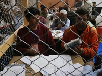 Election officials count votes for the local assembly elections at a counting center in Srinagar, Jammu and Kashmir, on October 8, 2024. (