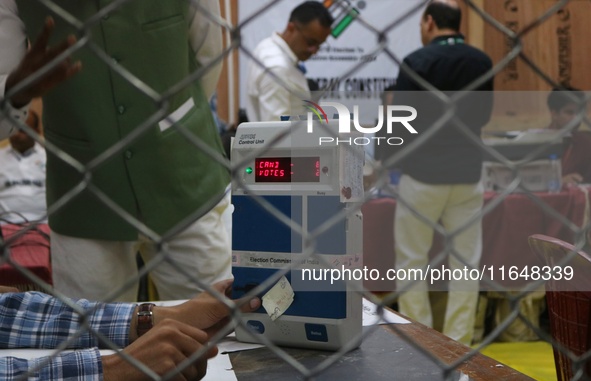 Election officials count votes for the local assembly elections at a counting center in Srinagar, Jammu and Kashmir, on October 8, 2024. 