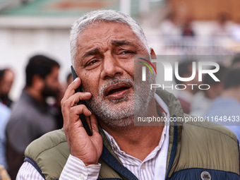 Irshad Rasool Kar, National Conference Candidate for Sopore Assembly Constituency, speaks to the media during election results in Baramulla,...