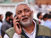 Irshad Rasool Kar, National Conference Candidate for Sopore Assembly Constituency, speaks to the media during election results in Baramulla,...