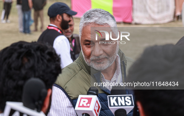 Irshad Rasool Kar, National Conference Candidate for Sopore Assembly Constituency, speaks to the media during election results in Baramulla,...