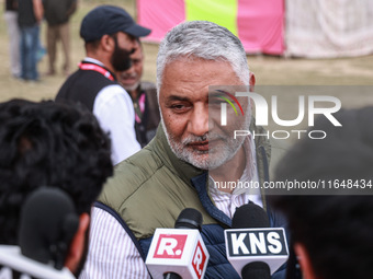 Irshad Rasool Kar, National Conference Candidate for Sopore Assembly Constituency, speaks to the media during election results in Baramulla,...