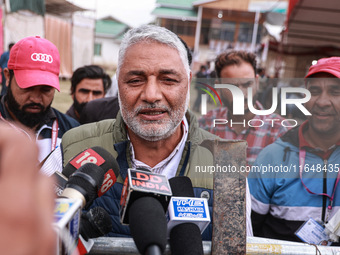 Irshad Rasool Kar, National Conference Candidate for Sopore Assembly Constituency, speaks to the media during election results in Baramulla,...