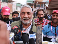 Irshad Rasool Kar, National Conference Candidate for Sopore Assembly Constituency, speaks to the media during election results in Baramulla,...