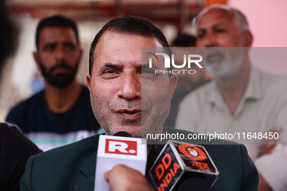 Pirzada Farooq Ahmed Shah, the National Conference candidate for the Gulmarg Assembly Constituency, speaks to the media during the results i...