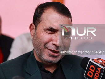 Pirzada Farooq Ahmed Shah, the National Conference candidate for the Gulmarg Assembly Constituency, speaks to the media during the results i...