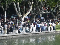 Crowds of people gather at West Lake during the National Day holiday in Hangzhou, China, on October 2, 2024. On October 8, 2024, according t...