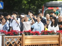 Crowds of people gather at West Lake during the National Day holiday in Hangzhou, China, on October 2, 2024. On October 8, 2024, according t...