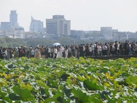 Crowds of people gather at West Lake during the National Day holiday in Hangzhou, China, on October 2, 2024. On October 8, 2024, according t...