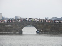 Crowds of people gather at West Lake during the National Day holiday in Hangzhou, China, on October 2, 2024. On October 8, 2024, according t...