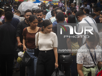 A crowd of people shops at a street market ahead of the Durga Puja festival in Guwahati, India, on October 7, 2024. Shopping ahead of Durga...